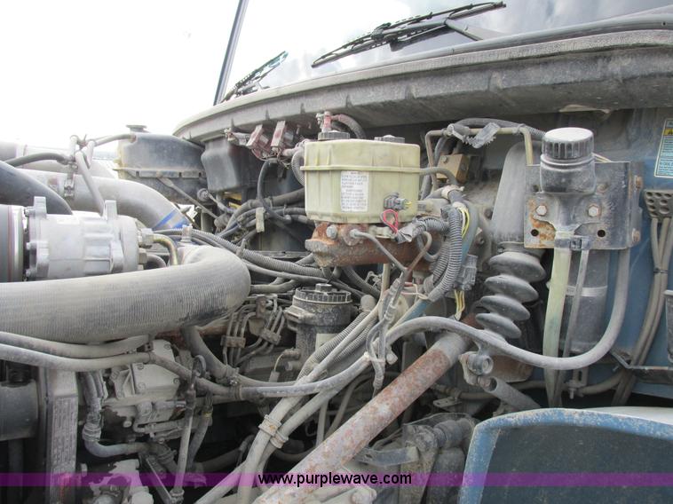 image for item I8814 2000 Freightliner FL70 fuel truck