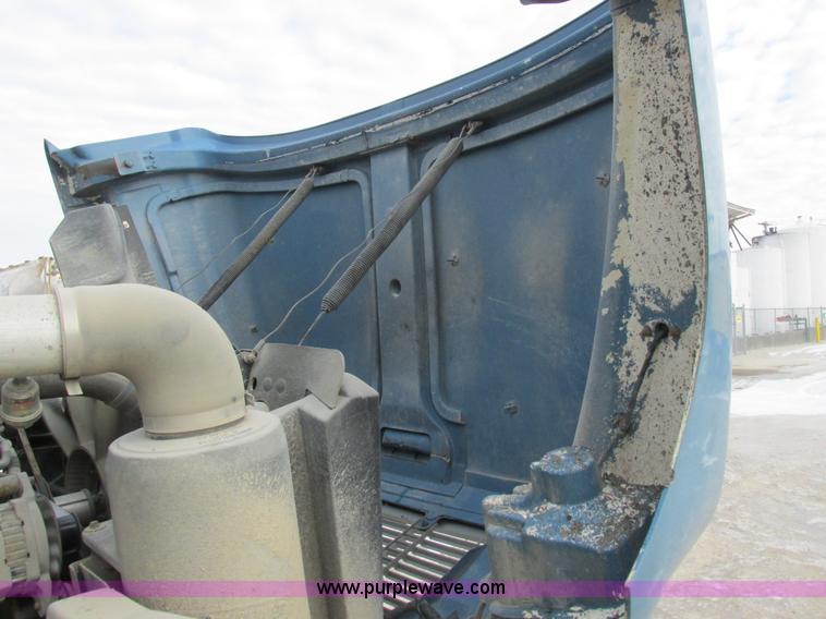 image for item I8814 2000 Freightliner FL70 fuel truck