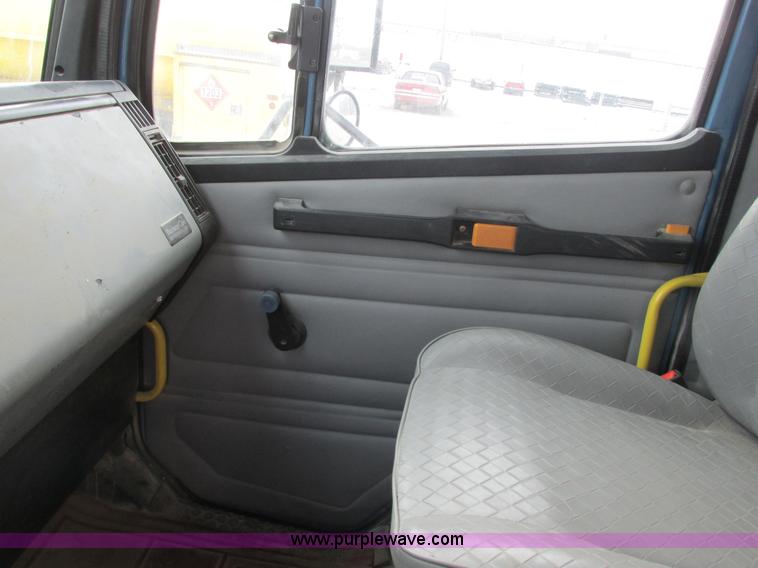 image for item I8814 2000 Freightliner FL70 fuel truck