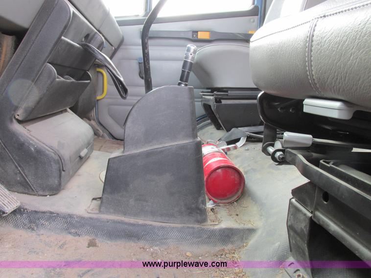 image for item I8814 2000 Freightliner FL70 fuel truck