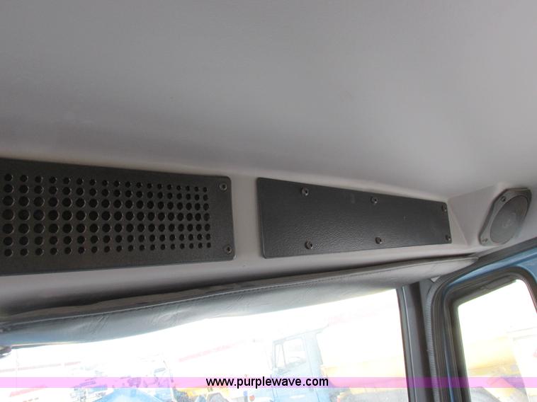 image for item I8814 2000 Freightliner FL70 fuel truck