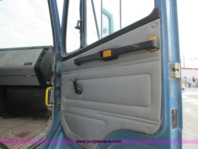 image for item I8814 2000 Freightliner FL70 fuel truck