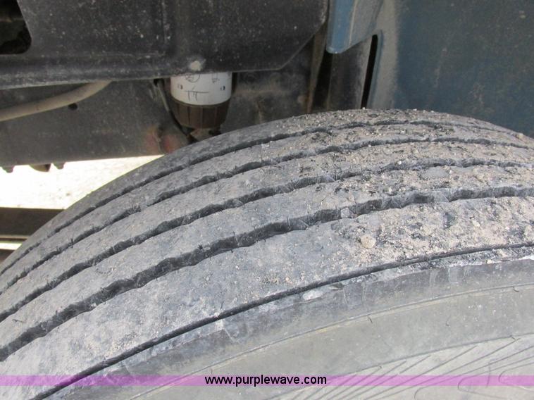 image for item I8814 2000 Freightliner FL70 fuel truck