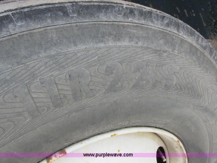 image for item I8814 2000 Freightliner FL70 fuel truck