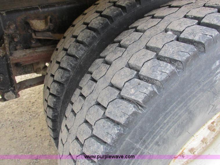 image for item I8814 2000 Freightliner FL70 fuel truck