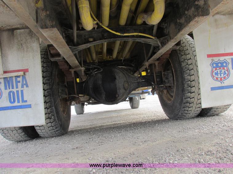 image for item I8814 2000 Freightliner FL70 fuel truck