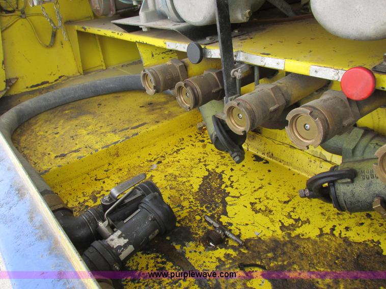 image for item I8814 2000 Freightliner FL70 fuel truck