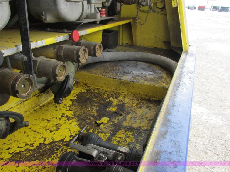 image for item I8814 2000 Freightliner FL70 fuel truck