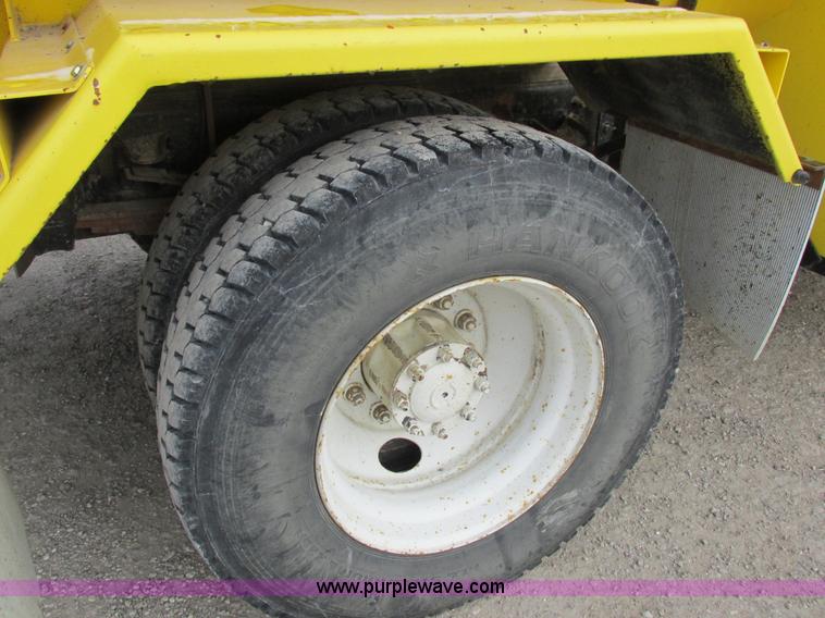 image for item I8814 2000 Freightliner FL70 fuel truck