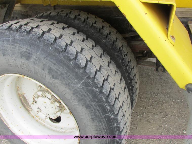 image for item I8814 2000 Freightliner FL70 fuel truck