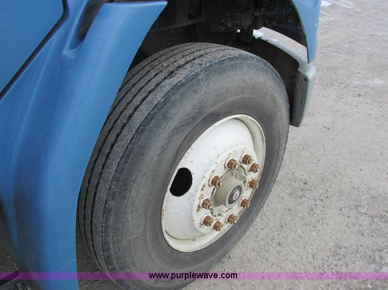 image for item I8814 2000 Freightliner FL70 fuel truck