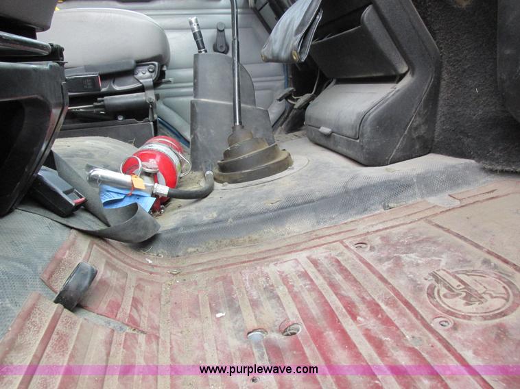 image for item I8814 2000 Freightliner FL70 fuel truck