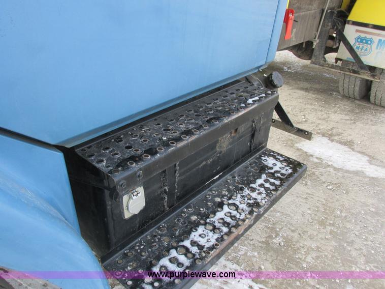 image for item I8814 2000 Freightliner FL70 fuel truck