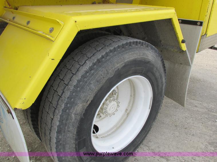 image for item I8814 2000 Freightliner FL70 fuel truck