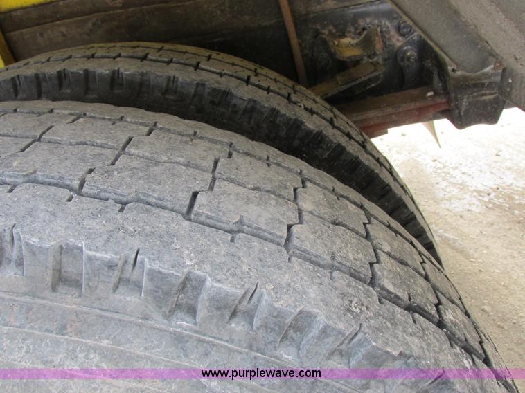 image for item I8814 2000 Freightliner FL70 fuel truck