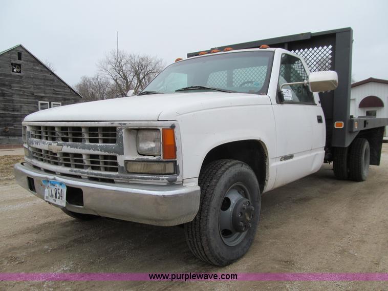 image for item J3323 1997 Chevrolet 3500 flatbed pickup truck