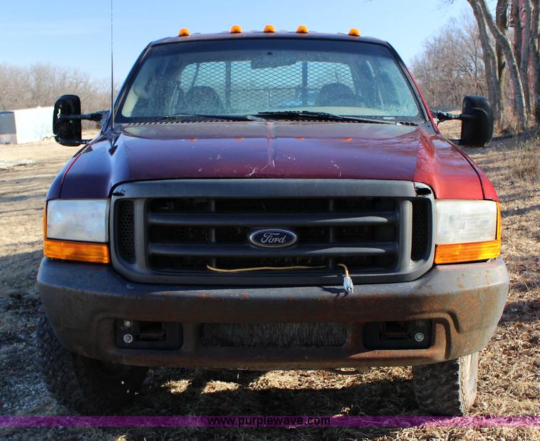 image for item L6552 2000 Ford F350 Super Duty XLT Crew Cab flatbed pickup truck