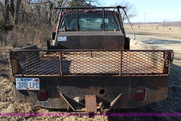 image for item L6552 2000 Ford F350 Super Duty XLT Crew Cab flatbed pickup truck