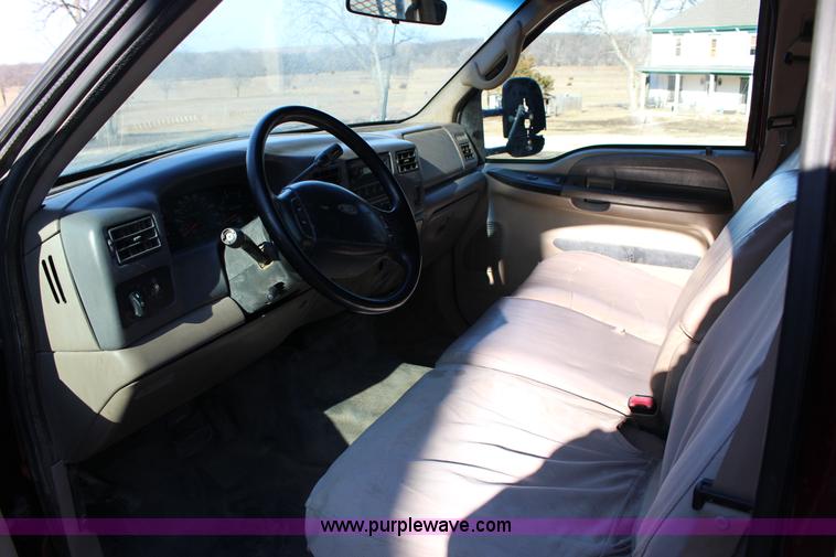 image for item L6552 2000 Ford F350 Super Duty XLT Crew Cab flatbed pickup truck