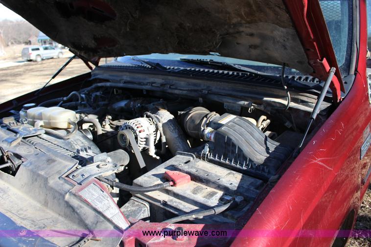 image for item L6552 2000 Ford F350 Super Duty XLT Crew Cab flatbed pickup truck