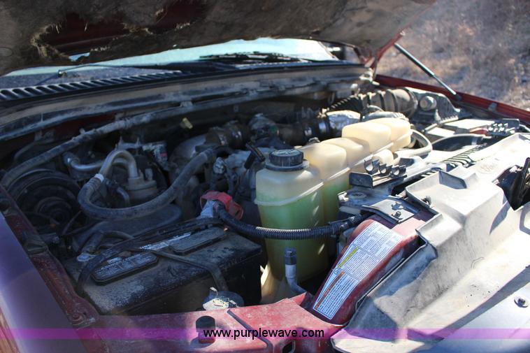 image for item L6552 2000 Ford F350 Super Duty XLT Crew Cab flatbed pickup truck