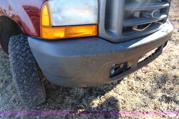 image for item L6552 2000 Ford F350 Super Duty XLT Crew Cab flatbed pickup truck