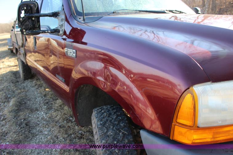 image for item L6552 2000 Ford F350 Super Duty XLT Crew Cab flatbed pickup truck