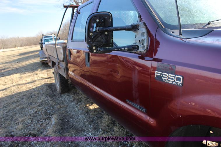 image for item L6552 2000 Ford F350 Super Duty XLT Crew Cab flatbed pickup truck