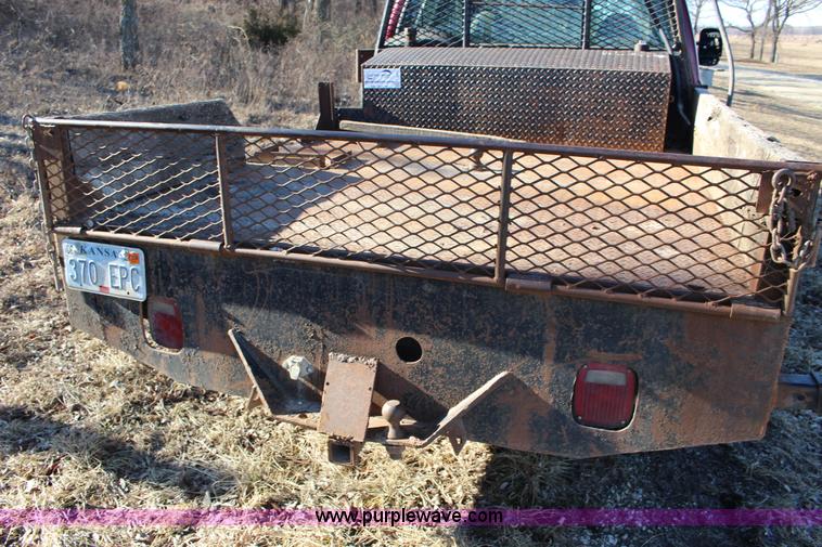 image for item L6552 2000 Ford F350 Super Duty XLT Crew Cab flatbed pickup truck