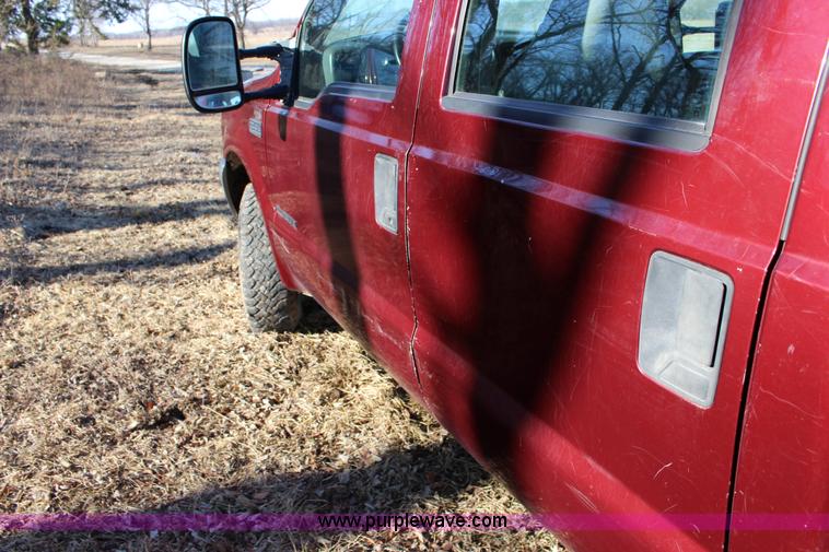 image for item L6552 2000 Ford F350 Super Duty XLT Crew Cab flatbed pickup truck