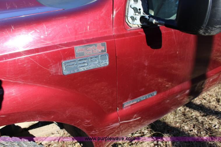 image for item L6552 2000 Ford F350 Super Duty XLT Crew Cab flatbed pickup truck