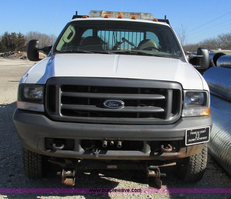 image for item AW9782 2004 Ford F350 Super Duty SuperCab flatbed pickup truck