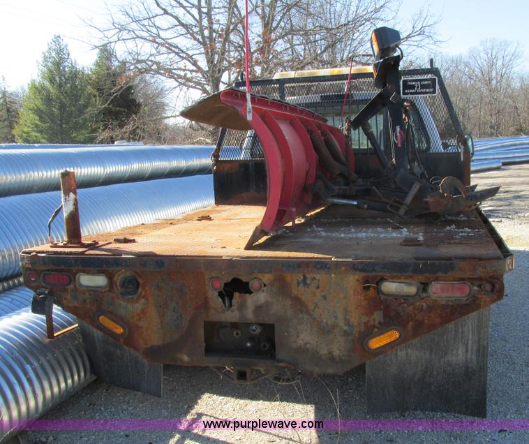 image for item AW9782 2004 Ford F350 Super Duty SuperCab flatbed pickup truck