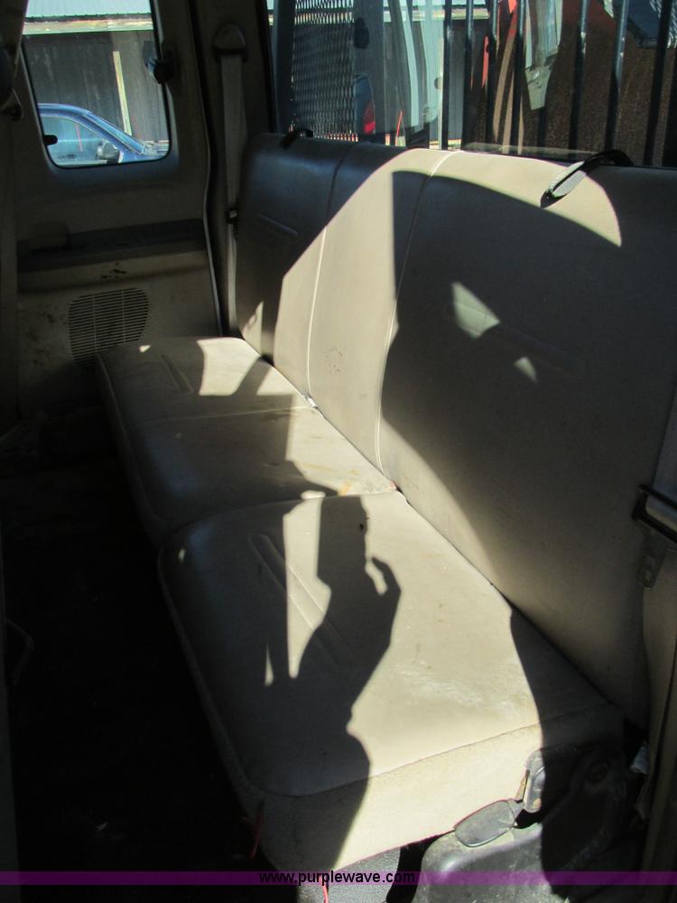 image for item AW9782 2004 Ford F350 Super Duty SuperCab flatbed pickup truck