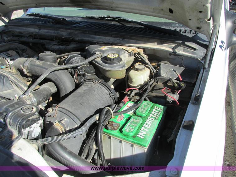 image for item AW9782 2004 Ford F350 Super Duty SuperCab flatbed pickup truck