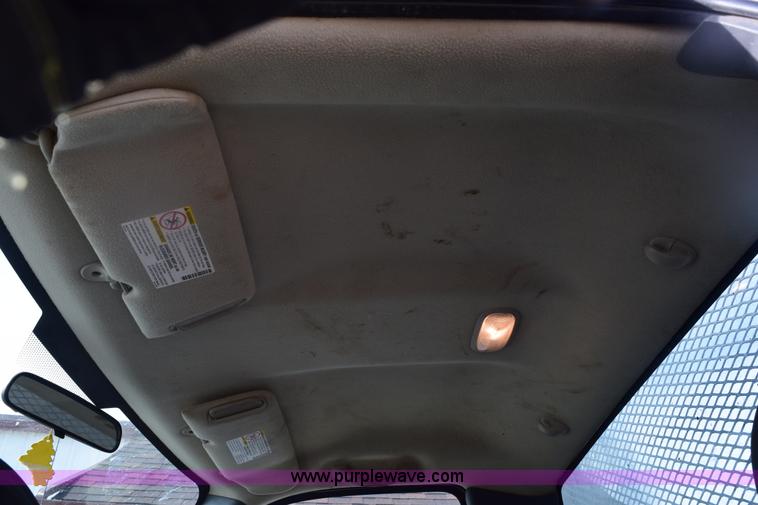 image for item E6123 2007 Chevrolet Silverado 2500HD flatbed pickup truck