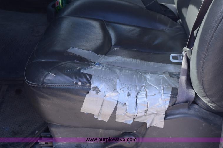 image for item E6123 2007 Chevrolet Silverado 2500HD flatbed pickup truck