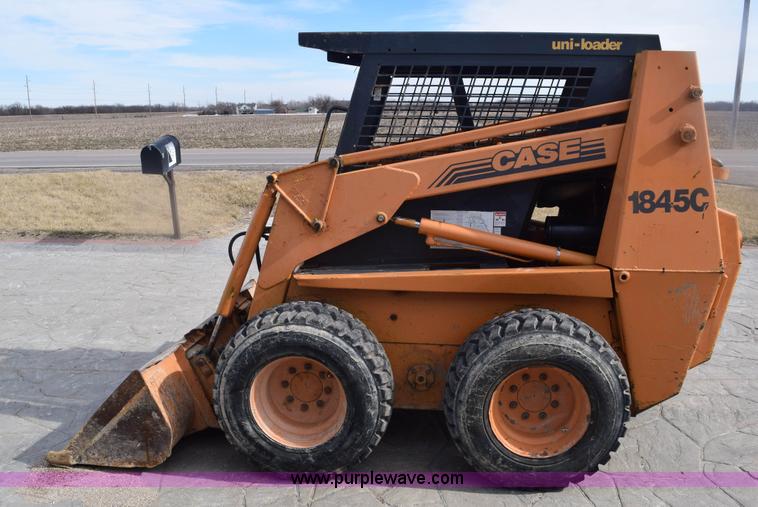 image for item E6124 1997 Case 1845C skid steer