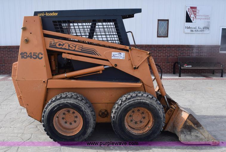 image for item E6124 1997 Case 1845C skid steer
