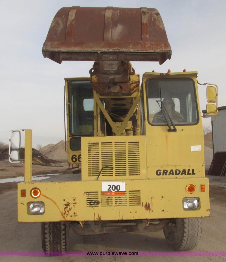 image for item G9796 Gradall G660E rubber tired excavator