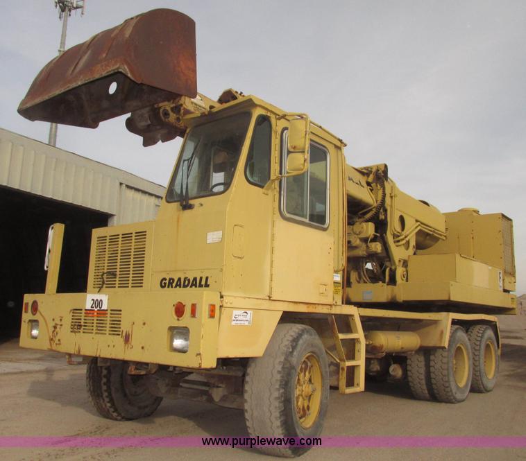 image for item G9796 Gradall G660E rubber tired excavator