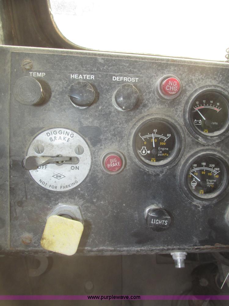 image for item G9796 Gradall G660E rubber tired excavator