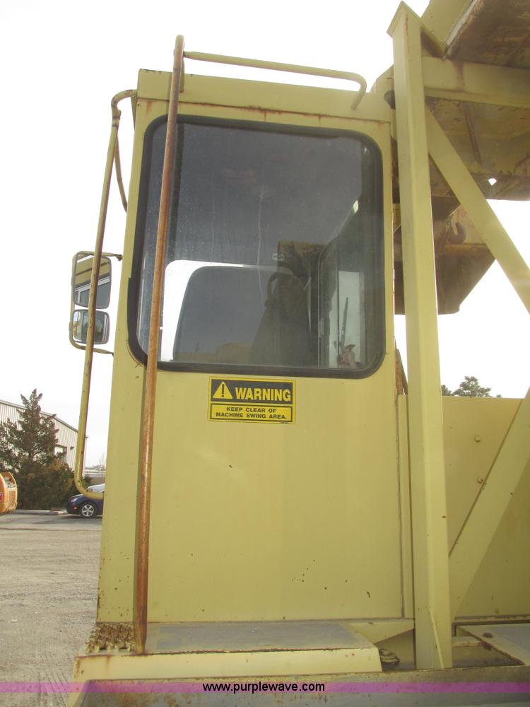 image for item G9796 Gradall G660E rubber tired excavator