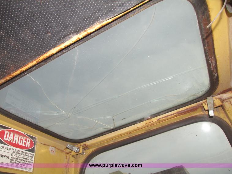 image for item G9796 Gradall G660E rubber tired excavator