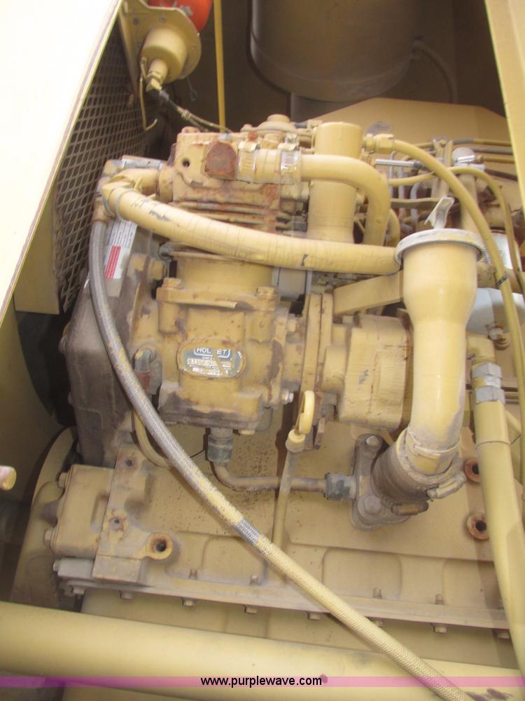 image for item G9796 Gradall G660E rubber tired excavator