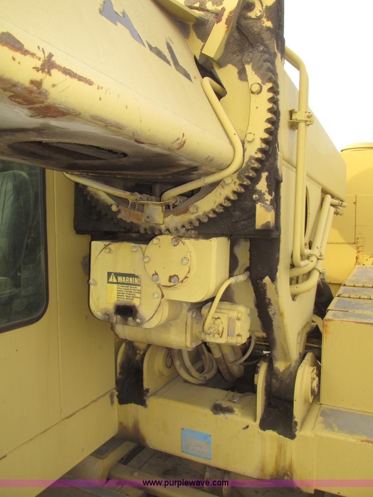 image for item G9796 Gradall G660E rubber tired excavator