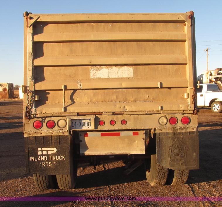 image for item G9811 1990 Cornhusker aluminum triple axle pup dump trailer