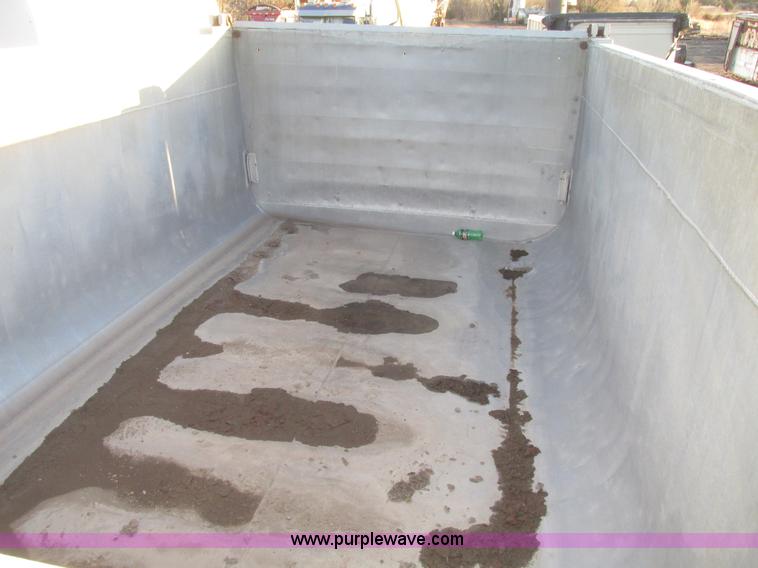 image for item G9811 1990 Cornhusker aluminum triple axle pup dump trailer