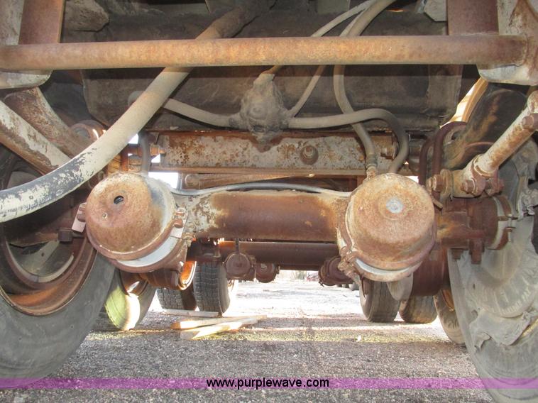 image for item G9811 1990 Cornhusker aluminum triple axle pup dump trailer