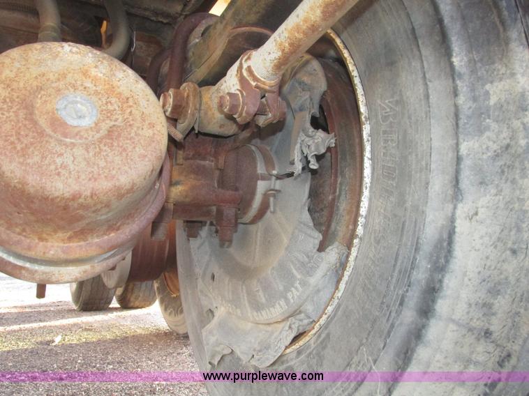 image for item G9811 1990 Cornhusker aluminum triple axle pup dump trailer